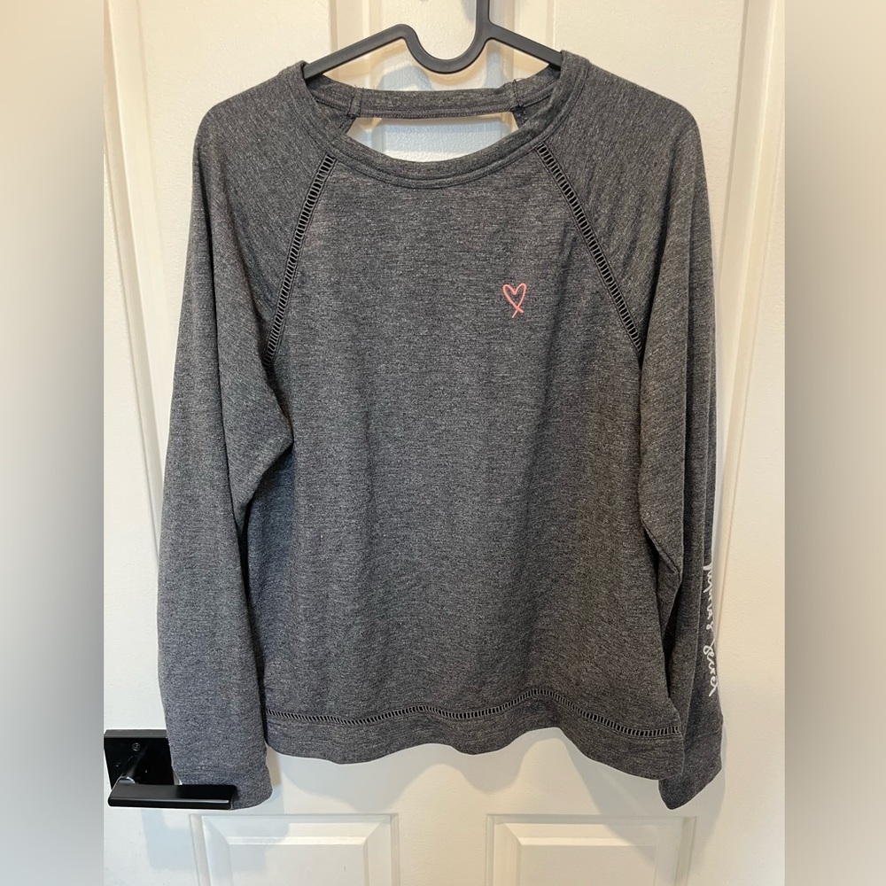 Victoria's Secret sport top with heart, open stitch and open back